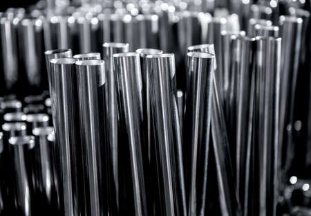 Abstract background of steel pipes stacked on a palletの写真素材