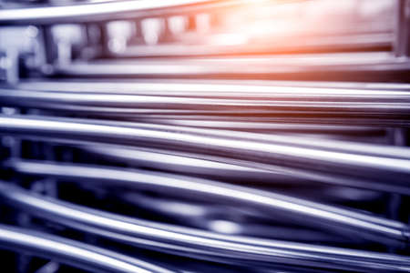 Abstract industrial background of metal pipes construction.の写真素材
