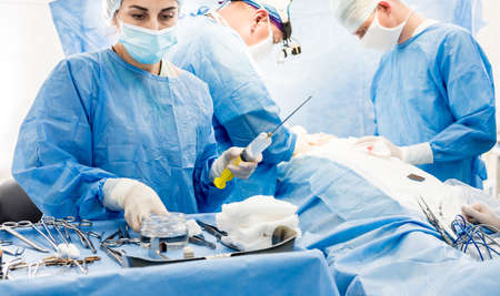 Surgery to remove the breast and replace it with an implant.の写真素材