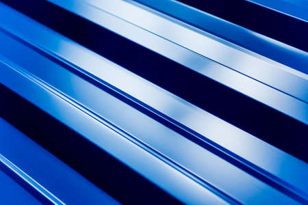 Blue metallic roof tiles background with drops of water.の写真素材