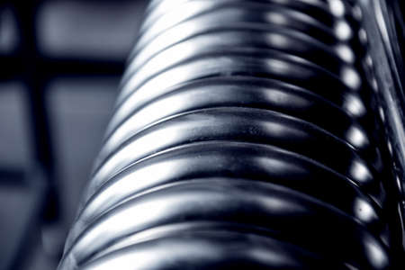 Abstract industrial background of metal pipes construction.の写真素材