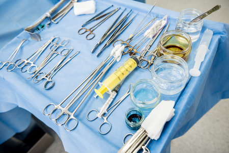 Steralized surgery instruments and devices on the table.