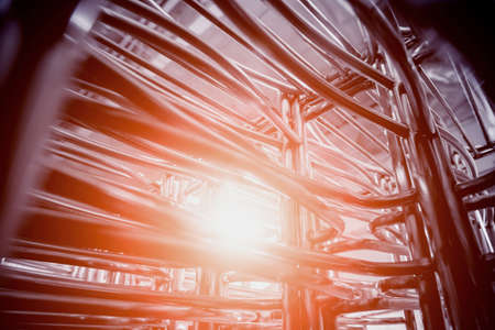 Abstract industrial background of metal pipes construction.の写真素材