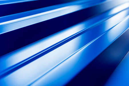Blue metallic roof tiles background with drops of water.の写真素材