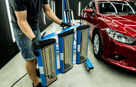 Infrared lamps for drying of car body parts after applying save gloss coatingの写真素材