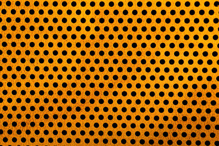 Background sheet of metal with circular holes
