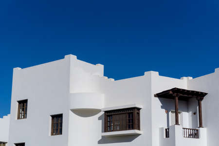 The view of top floor of house in the tropical garden with balcony and roofの写真素材