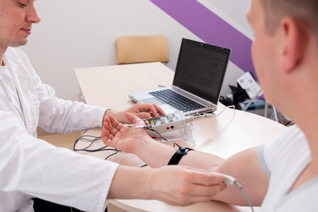 Patient nerves testing using electromyography at medical center