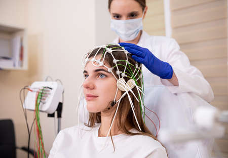 Patient brain testing using encephalography at medical centerの写真素材