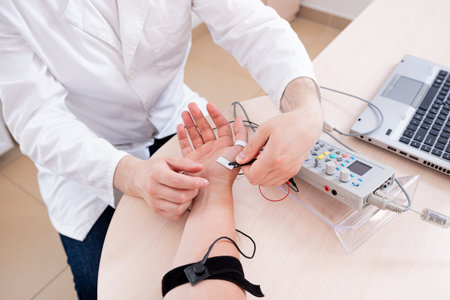 Patient nerves testing using electromyography at medical center