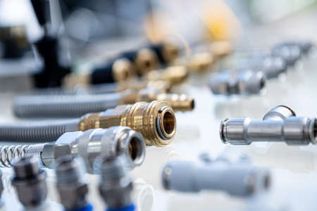 Plumbing and fittings on a light background.の写真素材