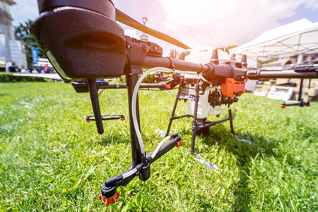 Professional agriculture drone on the green field