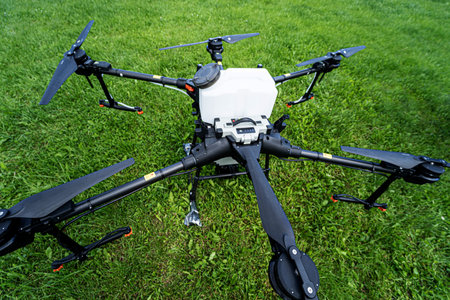 Professional agriculture drone on the green field