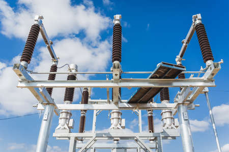 Construction of a power transmission substation on a background of blue skyの写真素材