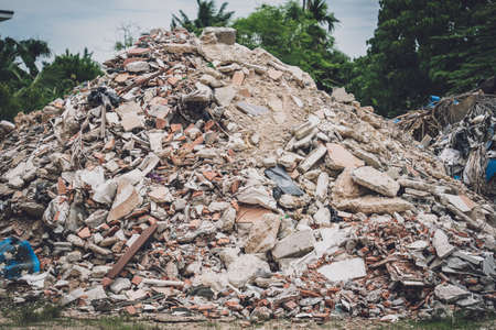 Waste plastic bottles and other types of waste at the groundの写真素材