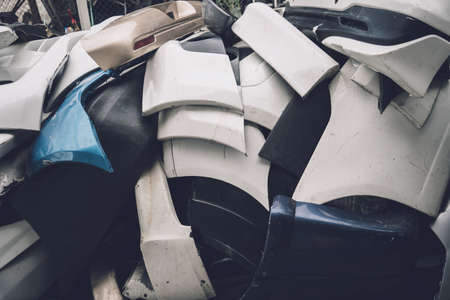 Heap of waste automotive parts in old car serviceの写真素材