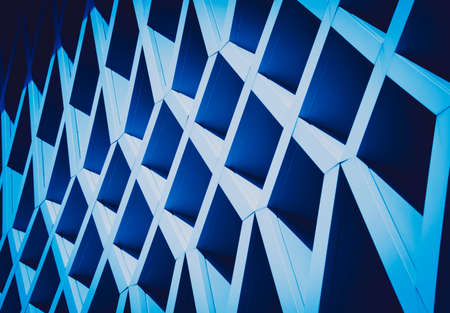 Abstract geometric background with triangles and buildings cellsの写真素材
