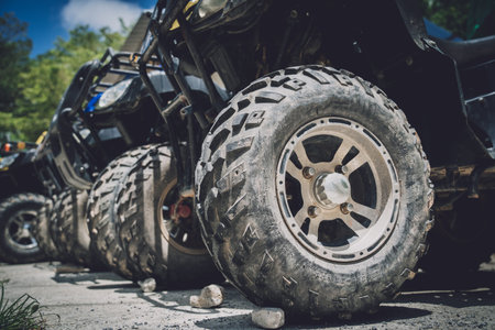 View of row dirty ATVs quad bikeの写真素材