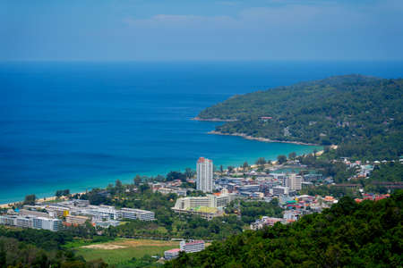 Beautiful mountains with palms landscape in the oceanの写真素材