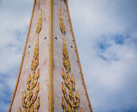 Details and fragments of old traditional buddhist temple in Thailandの写真素材