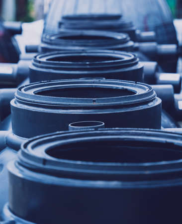 black plastic water storage tanks at the manufacturer factory depotの写真素材