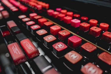 PHUKET, THAILAND - MAY 29, 2022: A rows of Chanel brand lipsticks in a case on the supermarket showcaseのeditorial素材