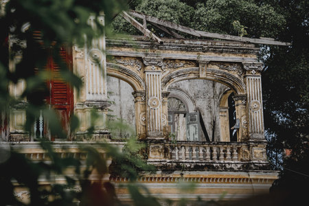 Colorful old house facades and ornate metal balconiesの写真素材