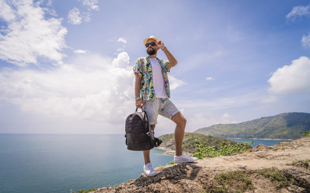 Young traveler man at summer holiday vacation with beautiful mountains and seascapes at background