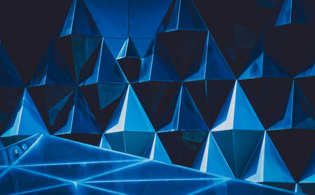 Abstract geometric background with triangles and buildings cellsの写真素材