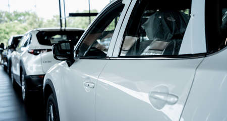PHUKET, THAILAND - JUNE 05, 2022: Cars in showroom of dealership Mazdaのeditorial素材