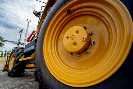 PHUKET, TAHAILAND - JUNE 05, 2022: Caterpillar heavy duty equipment vehicle on display area of dealershipのeditorial素材