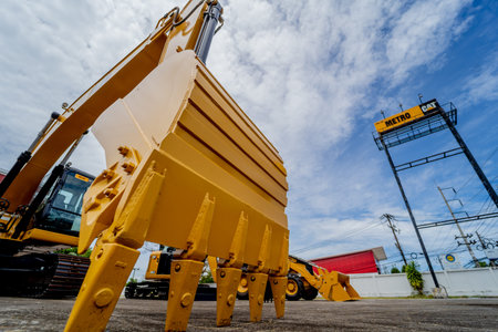PHUKET, TAHAILAND - JUNE 05, 2022: Caterpillar heavy duty equipment vehicle on display area of dealershipのeditorial素材