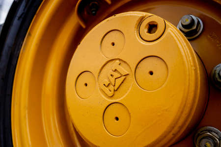 PHUKET, TAHAILAND - JUNE 05, 2022: Caterpillar heavy duty equipment vehicle on display area of dealershipのeditorial素材