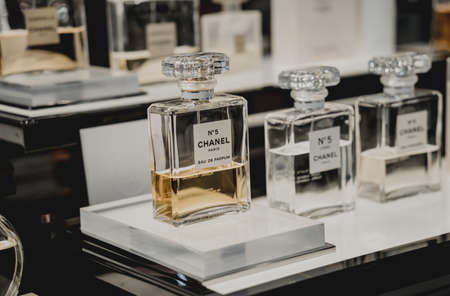 PHUKET, THAILAND - MAY 29, 2022: A rows of Chanel brand perfumes in a case on the supermarket showcaseのeditorial素材