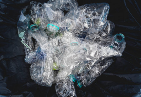 Large bags with collected plastic and other waste on the beach