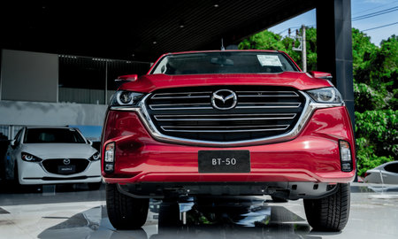 PHUKET, THAILAND - JUNE 05, 2022: Cars in showroom of dealership Mazdaのeditorial素材