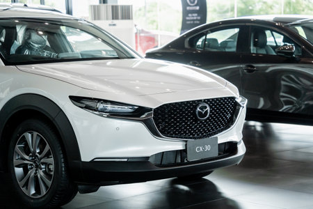 PHUKET, THAILAND - JUNE 05, 2022: Cars in showroom of dealership Mazdaのeditorial素材