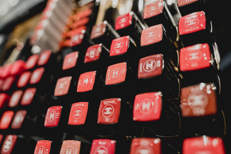 PHUKET, THAILAND - MAY 29, 2022: A rows of Chanel brand lipsticks in a case on the supermarket showcaseのeditorial素材