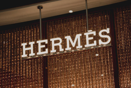 PHUKET, THAILAND - MAY 29, 2022: Hermes brand retail shop logo signboard on the storefront in the shopping mallのeditorial素材
