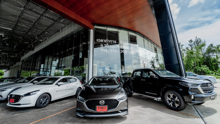 PHUKET, THAILAND - JUNE 05, 2022: Cars in showroom of dealership Mazdaのeditorial素材