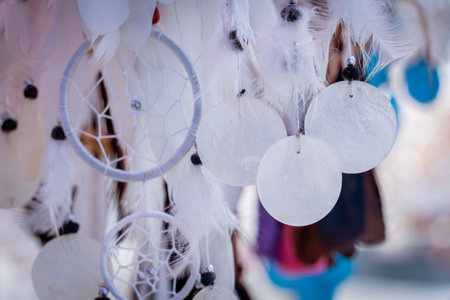 Dreamcatcher with feathers threads and beads rope hangingの写真素材