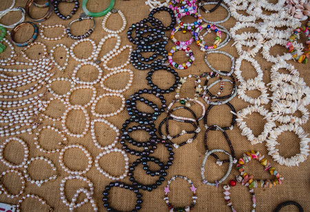Many colorful bracelets from handcraft souvenirs shop