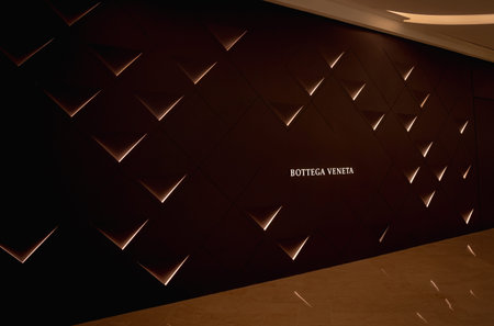 KUALA LUMPUR, MALAYSIA - DECEMBER 04, 2022: Bottega Veneta brand retail shop logo signboard