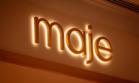 KUALA LUMPUR, MALAYSIA - DECEMBER 04, 2022: Maje brand retail shop logo signboard on the storefront in the shopping mallのeditorial素材