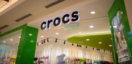 KUALA LUMPUR, MALAYSIA - DECEMBER 04, 2022: Crocs brand retail shop logo signboard