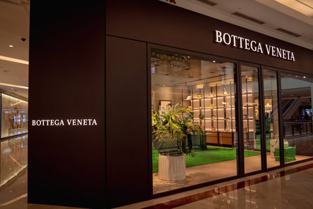 KUALA LUMPUR, MALAYSIA - DECEMBER 04, 2022: Bottega Veneta brand retail shop logo signboard