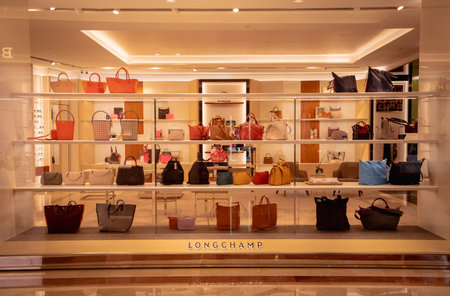 KUALA LUMPUR, MALAYSIA - DECEMBER 04, 2022: Longchamp brand retail shop logo signboard on the...
