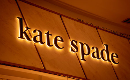 KUALA LUMPUR, MALAYSIA - DECEMBER 04, 2022: Kate Spade brand retail shop logo signboard on the...