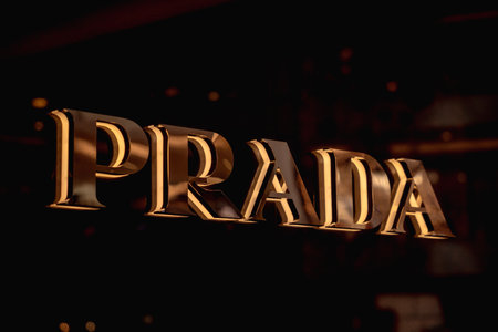 KUALA LUMPUR, MALAYSIA - DECEMBER 04, 2022: Prada brand retail shop logo signboard on the storefront in the shopping mallのeditorial素材