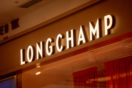 KUALA LUMPUR, MALAYSIA - DECEMBER 04, 2022: Longchamp brand retail shop logo signboard on the...